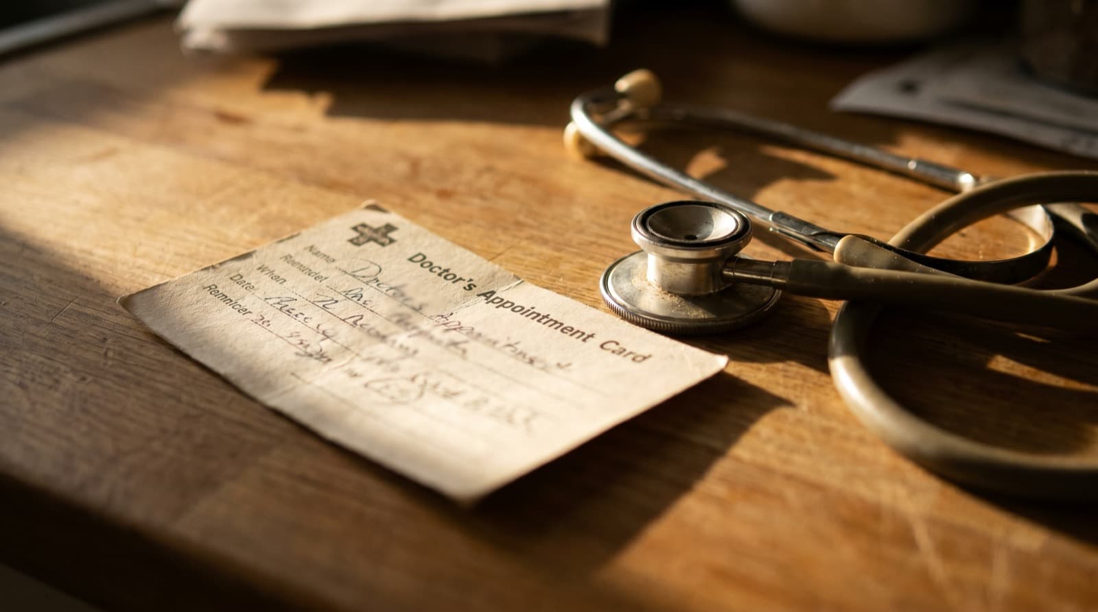 Calendar with checkmarks next to preventive care appointments like screenings and vaccines